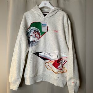 Jordan Cream Graphic Hoodie with Red and Green Accents